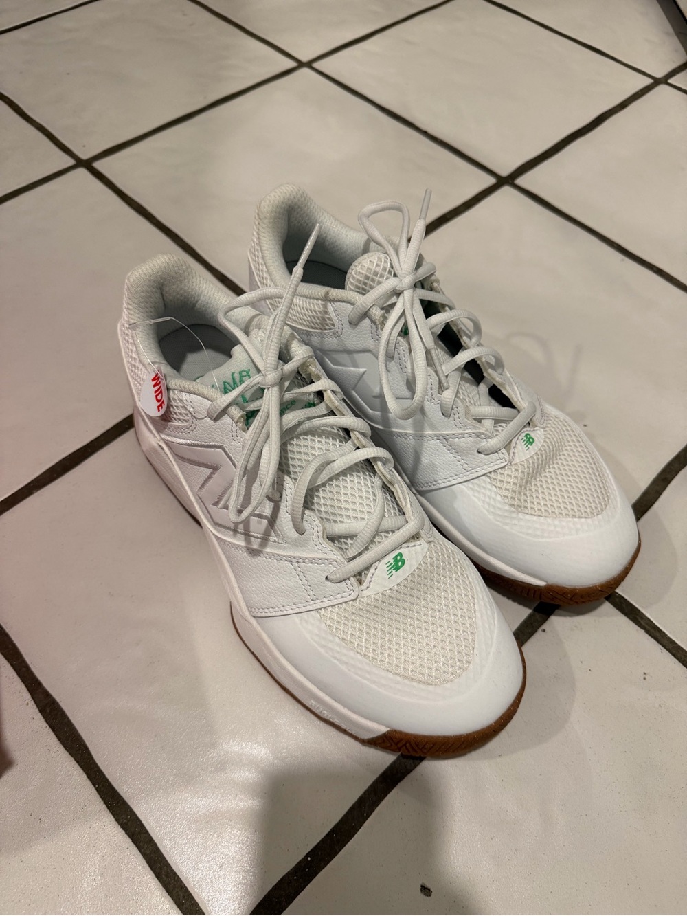 New Balance White Athletic Sneakers with Green Accents and Gum Outsole
